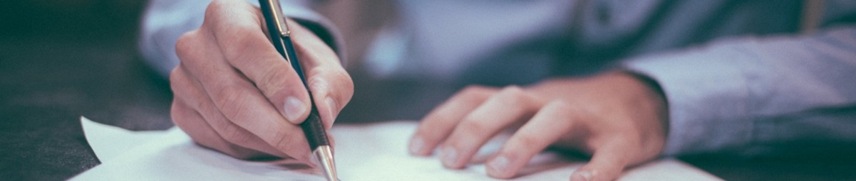 Hand Signing Paper