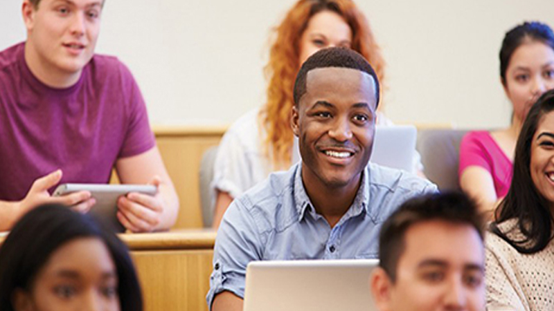 Image of classroom with male student