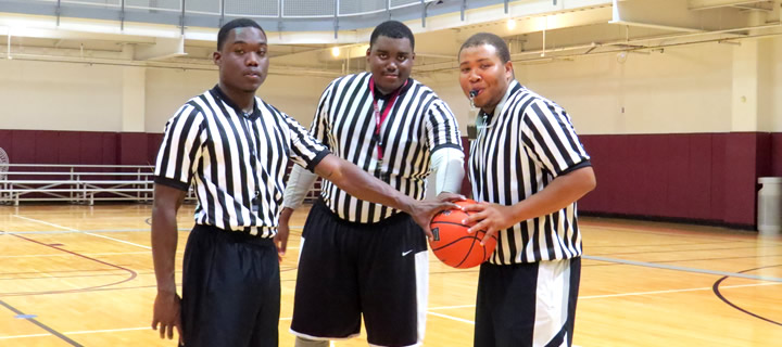 Referees on basketball court