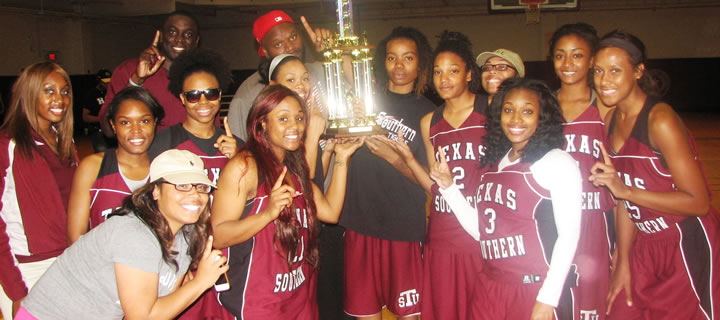 Coed basketball team celebrating